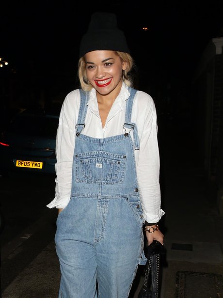 Rita Ora wearing dungareese