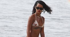 Rihanna in Barbados on a beach