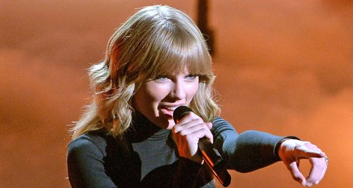 Taylor Swift performs on the X Factor