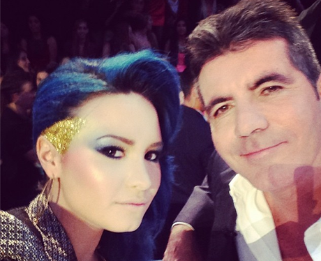 Demi Lovato and Simon Cowell