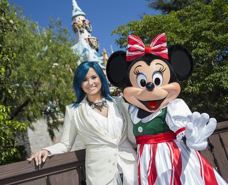 Demi Lovato poses with Minnie Mouse