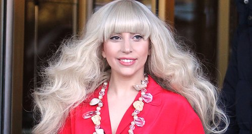 Lady Gaga wearing a red playsuit