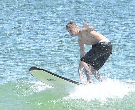 Justin Bieber surfing in Australia