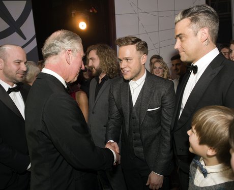 Olly Murs and Robbie Williams tak to Price Charles