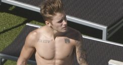 Justin Biebe topless in Australia