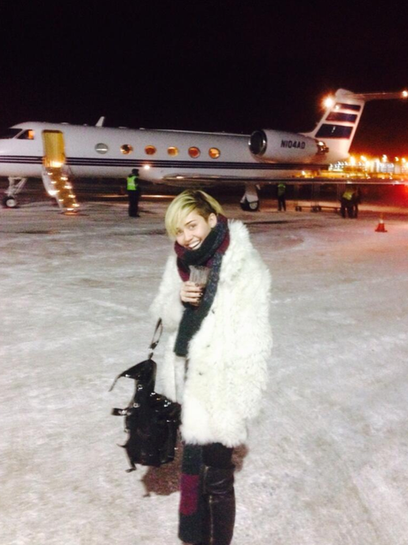 Miley Cyrus boards a private jet