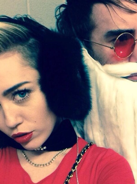 Miley Cyrus and her Santa on tour