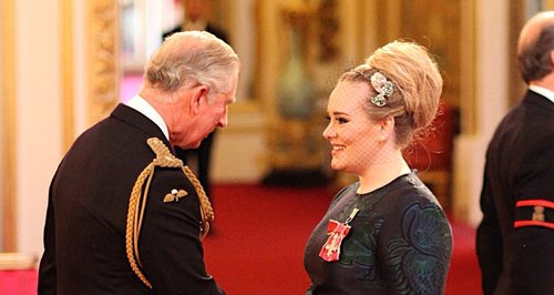 Adele with Prince Charles at Buckingham Palace
