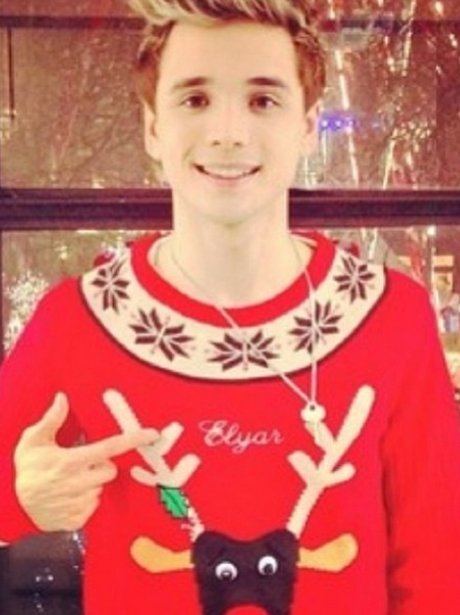 Elyar Fox poses in his Christmas jumper