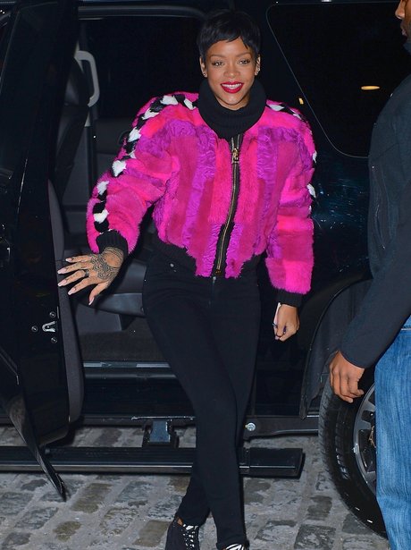 Rihanna wearing a neon jacket