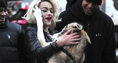 Rita Ora with a dog on photshoot