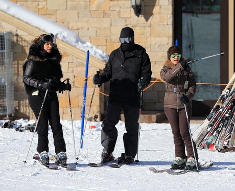 Kanye West and Kim Kasdashian skiing