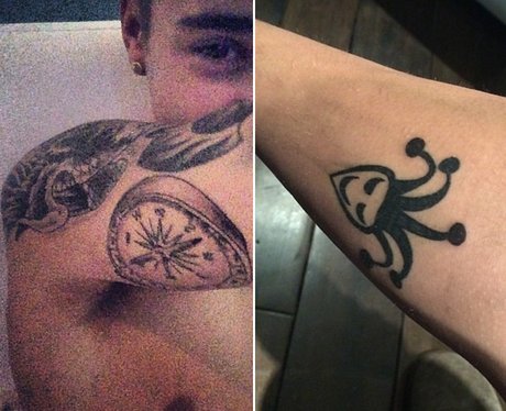 Justin Bieber shows off his new tattoos