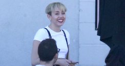 Miley Cyrus shows off new bowl hair cut