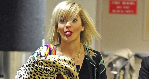 Rita Ora sticking her tongue out at the airport