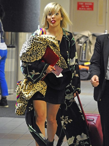 Rita Ora sticking her tongue out at the airport