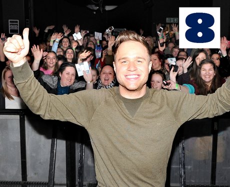 Olly Murs poses with some of his fans