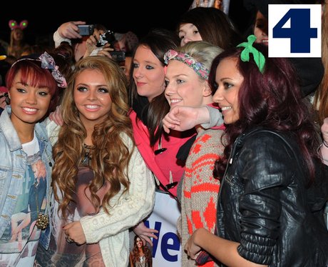 Little Mix pose with some of their fans
