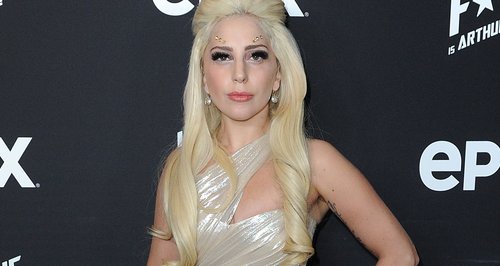 Lady Gaga wearing a gold gown