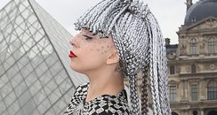 Lady Gaga attends Paris fashion week with grey wig