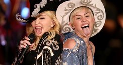 Miley Cyrus and Madonna on stage