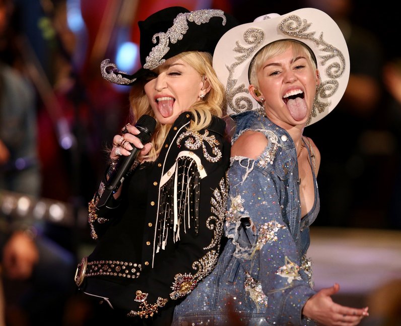 Miley Cyrus and Madonna on stage