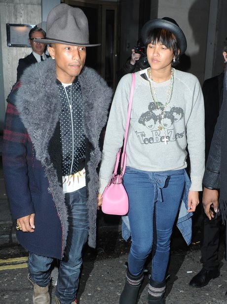 Pharrell with his girlfriend