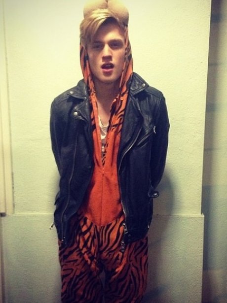 Tristan from The Vamps wearing a onesie