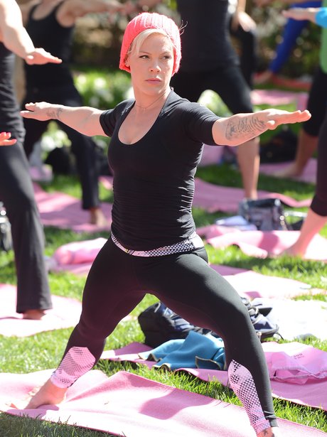 Pink doing yoga