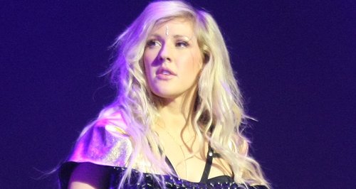 Ellie Goulding wearing a leotard on stage