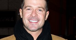 Robin Thicke smiling after split