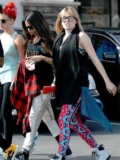 Selena Gomez wearing glasses