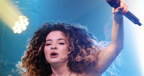 Ella Eyre performs on stage 