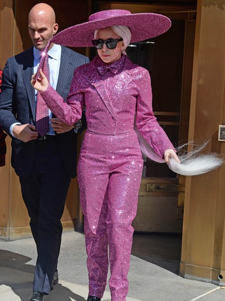 Lady Gaga wearing a sequin pink outfit
