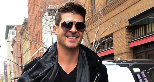 Robin Thicke looks happy in New York