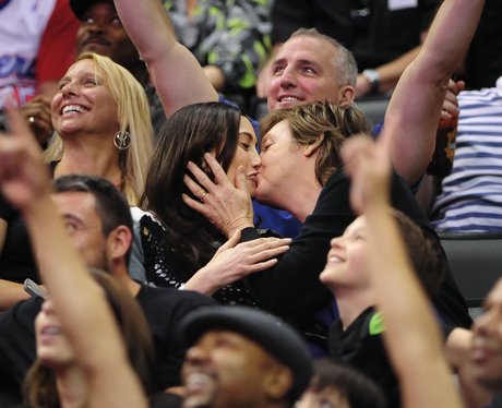 Sir Paul McCartney and Nancy Shevell kiss for "kis