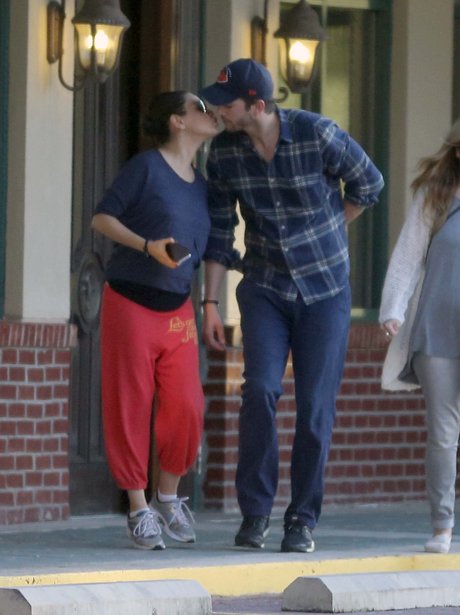 Mile Kunis baby bump