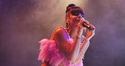 Lily Allen performing on stage