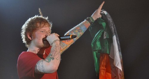 Ed Sheeran performs on stage