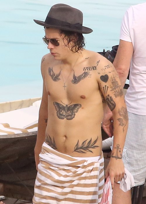 One Direction S Harry Styles Reveals Bum Tattoo During Where We Are Tour Capital