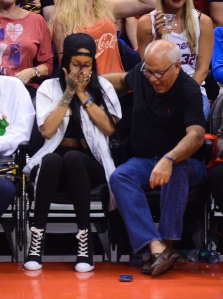 Rihanna attends basket ball game