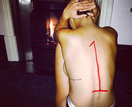 Rita Ora topless on Instagram