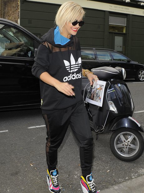 Rita Ora wearing a tracksuit
