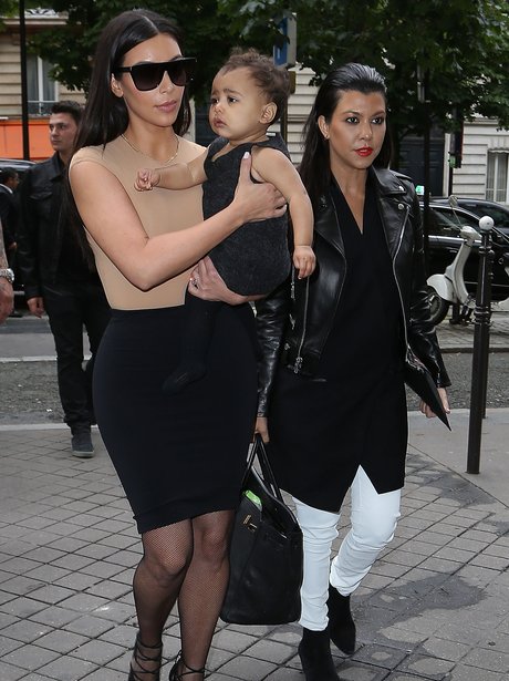 Kim Kardashian with baby North and her sister