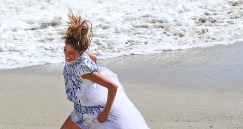 Nicole Scherzinger filming video on the beach