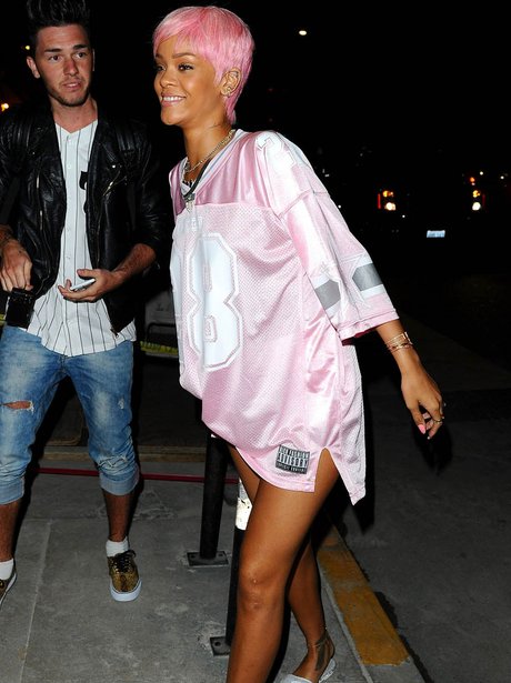 Rihanna wearing a pink outfit