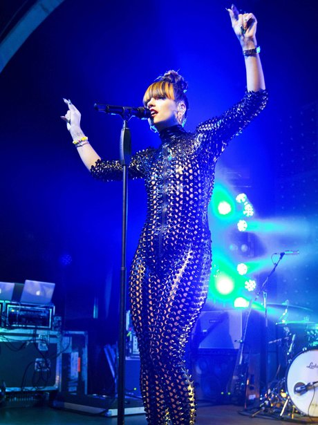 Lily Allen performs in a catsuit