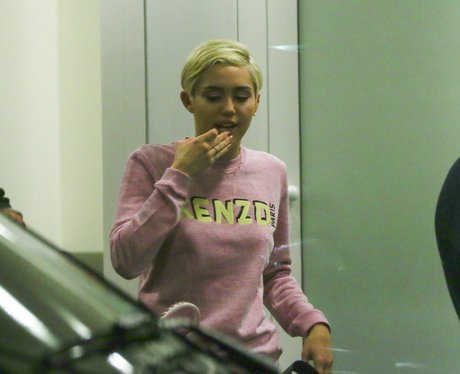 Miley Cyrus arrives at the airport