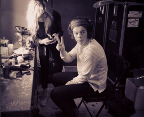 Harry Styles posing backstage