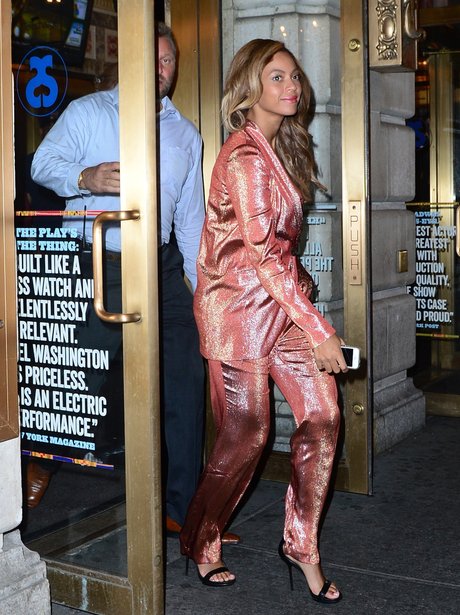 Beyonce wears a trouser suit on a night out